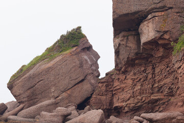 Fototapeta na wymiar Indian Head Rock (The Indian Who Never Sees the Sea), St.-Georges-de-Malbaie, Gaspe Peninsula, Quebec, Canada. 