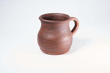 Pottery Craft, ceramic product with your own hands, made on a Potter's wheel, isolated on a white background.