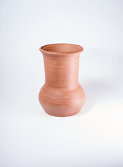 Pottery Craft, ceramic product with your own hands, made on a Potter's wheel, isolated on a white background.