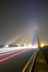 Fototapeta na wymiar bridge over water whit fog