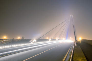 Fototapeta na wymiar bridge over water whit fog