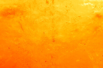Salt lamp. The texture of the salt lamp, rock orange, close up. Blurred background