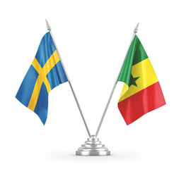Senegal and Sweden table flags isolated on white 3D rendering