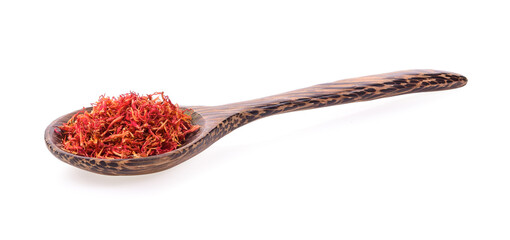 Safflower in wood spoon on white background