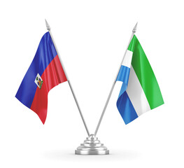 Sierra Leone and Haiti table flags isolated on white 3D rendering