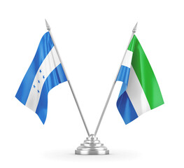 Sierra Leone and Honduras table flags isolated on white 3D rendering