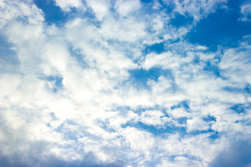 Blue sky and white clouds in day time.
