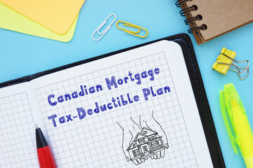 Financial concept meaning Canadian Mortgage Tax-Deductible Plan with sign on the sheet.