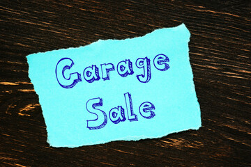 Financial concept meaning Garage Sale with inscription on the piece of paper.