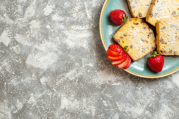 top view delicious cake slices with fruits on a light background pie fruit cake sweet