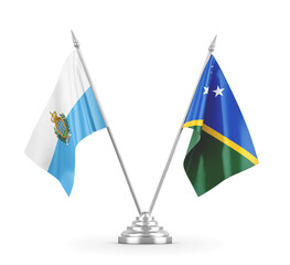 Solomon Islands and San Marino table flags isolated on white 3D rendering