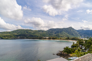 Fototapeta na wymiar View of the beautiful Andaman sea with fluffy wihte clouds in Phuket, southern Thailand
