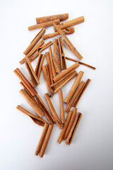 Cinnamon close up on a white background