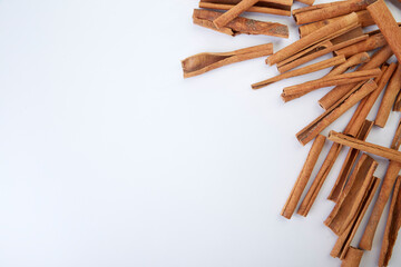 Cinnamon close up on a white background