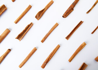 Cinnamon close up on a white background
