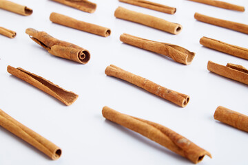 Cinnamon close up on a white background