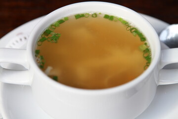 Beef consomme with pancake julienne