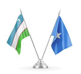 Somalia and Uzbekistan table flags isolated on white 3D rendering