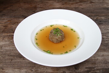 Traditional Austrian consomme with liver dumpling
