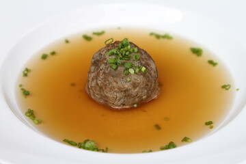 Traditional Austrian consomme with liver dumpling