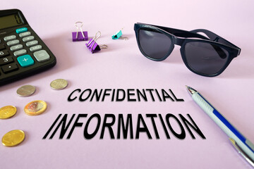 Text writing Confidential Information. Calculator, money and glasses