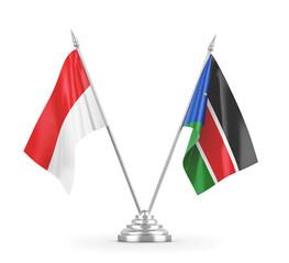 South Sudan and Indonesia table flags isolated on white 3D rendering