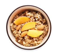 Bowl with tasty sweet oatmeal on white background