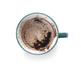 Cup with spent coffee grounds for fortune telling on white background
