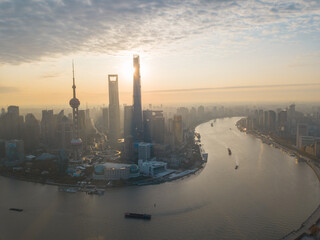 Naklejka premium Aerial view of the sunrise in Lujiazui, the financial district in Shanghai, China.