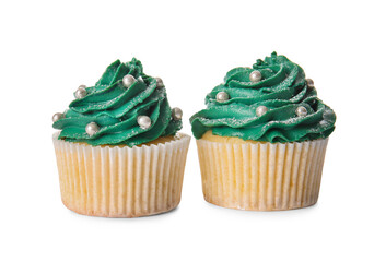 Tasty Christmas cupcakes on white background