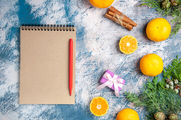 top view fresh tangerines with notepad on light-blue background juice citrus photo color fruit