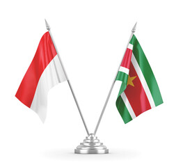 Suriname and Indonesia table flags isolated on white 3D rendering