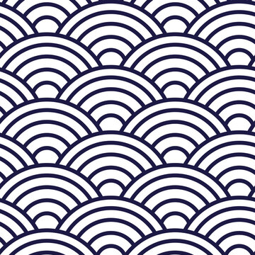 Oriental wave pattern from Japan in blue. Seamless classic japanese kimono pattern, round pattern with shell or fish scales motifs. Asian or chinese abstract ornament. For wrapping or textile design