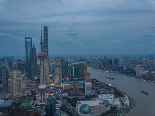 Aerial view of lujiazui, the financial district and modern skyline in Shanghai, China, on a cloudy day.