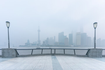 The bund in Shanghai, on a thick foggy day.