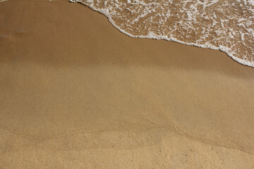 brown Sand beach and foam