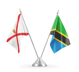 Tanzania and Jersey table flags isolated on white 3D rendering