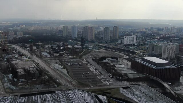 Flying Towards City Center Above Parking in The Winter Katowice