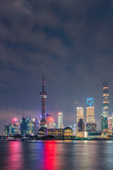 Fototapeta premium Night view of Lujiazui, the financial district and modern skyline in Shanghai, China.