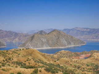 Colorful landscape view of Nurek dam lake second highest in world between Dushanbe and Khatlon,...