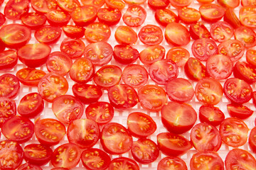 cherry tomatoes cut as background