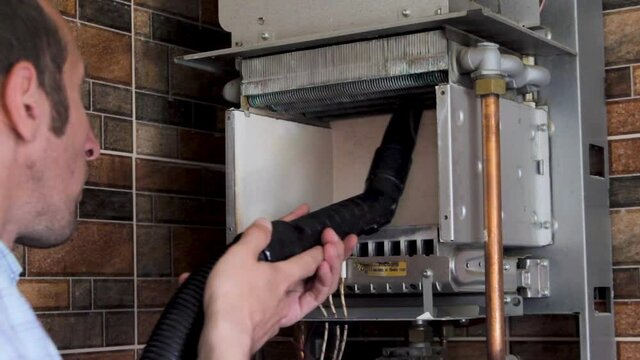 vacuum cleaner to remove dust in  boiler,maintenance of gas boilers at home