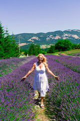 Beautiful blonde woman in a lavender field