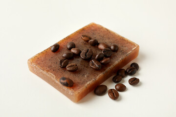 Piece of natural coffee soap on white background