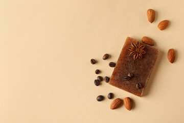 Piece of natural handmade soap on beige background