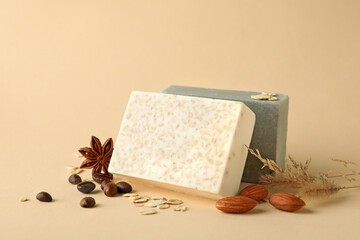 Pieces of natural handmade soap on beige background