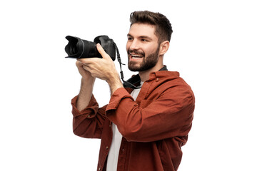 Fototapeta premium photography, profession and people and concept - happy smiling man or photographer with digital camera over white background