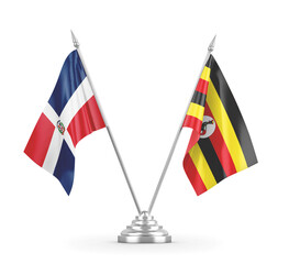 Uganda and Dominican Republic table flags isolated on white 3D rendering