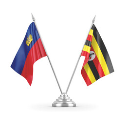 Uganda and Liechtenstein table flags isolated on white 3D rendering