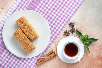 top view yummy cake slices with tea on a light background pie cake biscuit